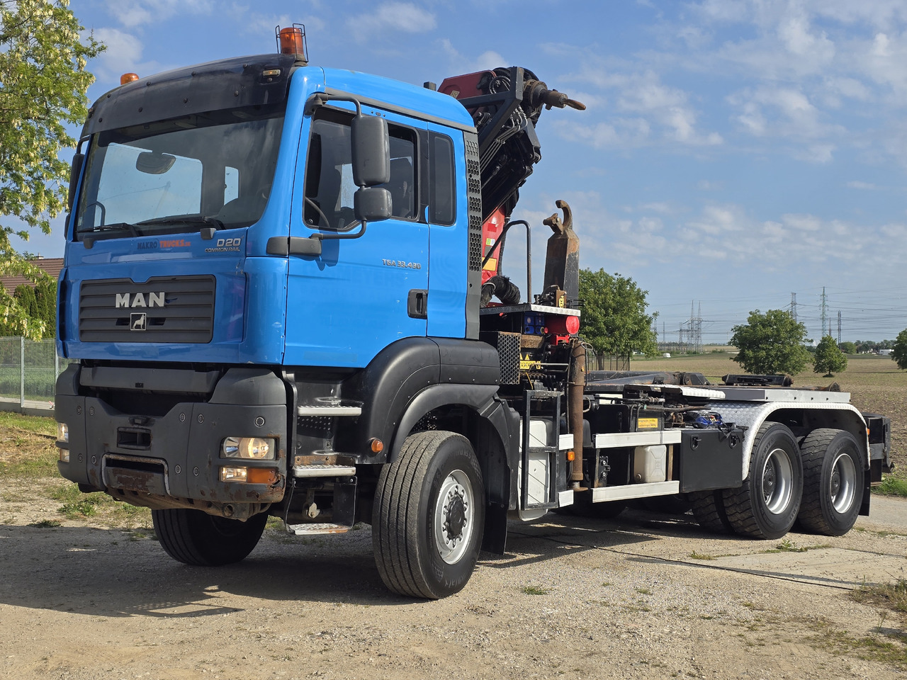 MAN TGA 33.430 6X6 / HMF 1823 K3+REM.CON./ HOOK SYSTEM - Kamion vetëngarkues, Kamion me vinç: foto 1 MAN TGA 33.430 6X6 / HMF 1823 K3+REM.CON./ HOOK SYSTEM - Kamion vetëngarkues, Kamion me vinç: foto 1