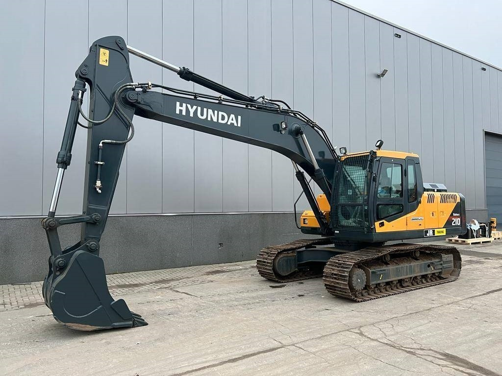 Hyundai R 210 - Ekskavator me zinxhirë: foto 2 Hyundai R 210 - Ekskavator me zinxhirë: foto 2