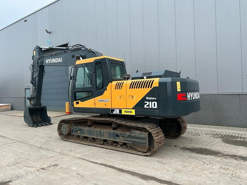 Hyundai R 210 - Ekskavator me zinxhirë: foto 3 Hyundai R 210 - Ekskavator me zinxhirë: foto 3