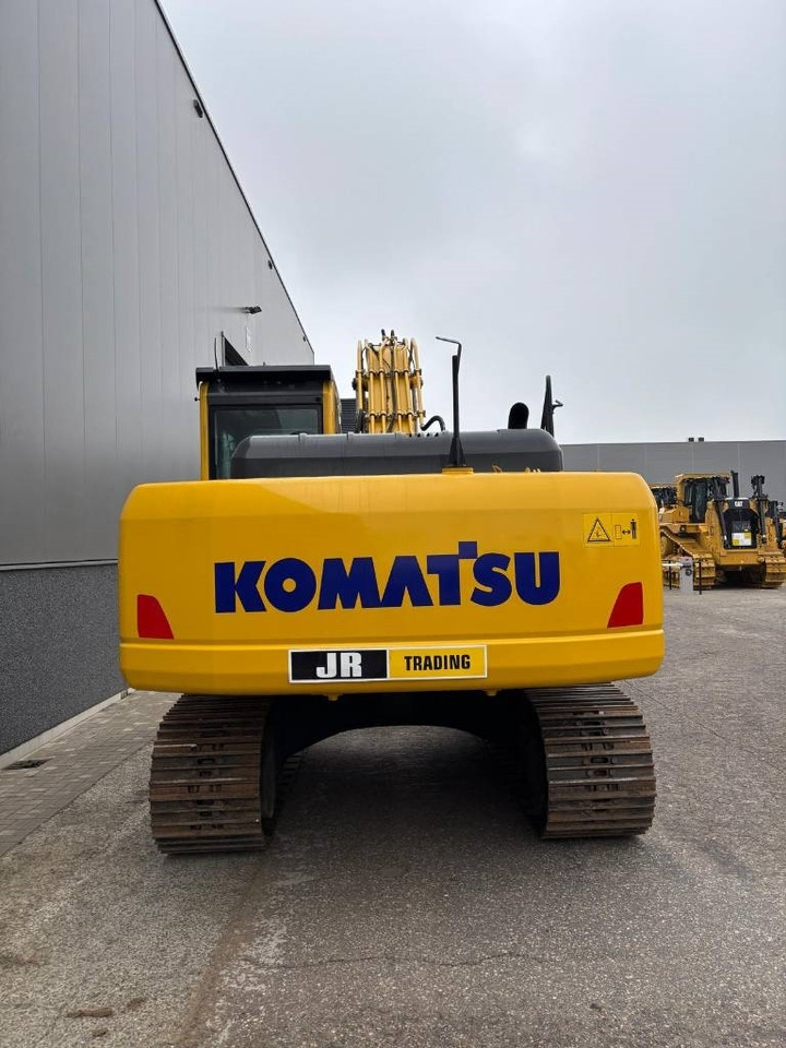 Komatsu PC 210-10M0 - Ekskavator me zinxhirë: foto 4 Komatsu PC 210-10M0 - Ekskavator me zinxhirë: foto 4