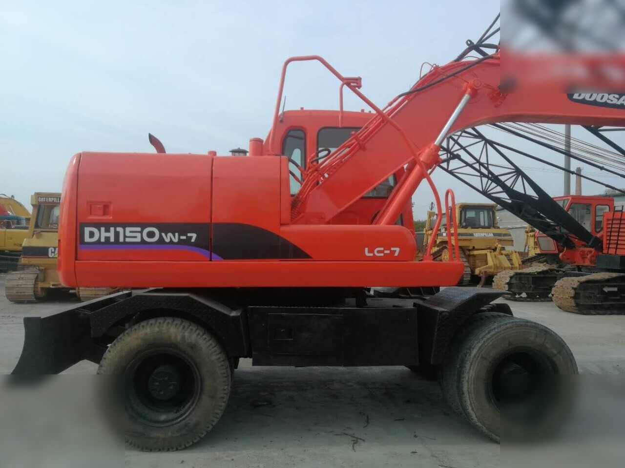 DOOSAN DH150W-7 - Ekskavator me goma: foto 5 DOOSAN DH150W-7 - Ekskavator me goma: foto 5