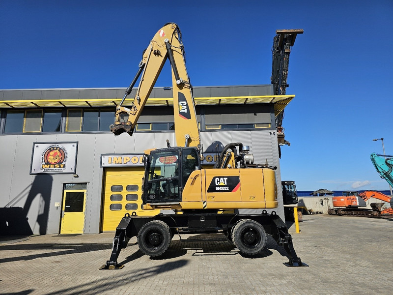 Caterpillar MH 3022 - Ekskavator me goma: foto 1 Caterpillar MH 3022 - Ekskavator me goma: foto 1