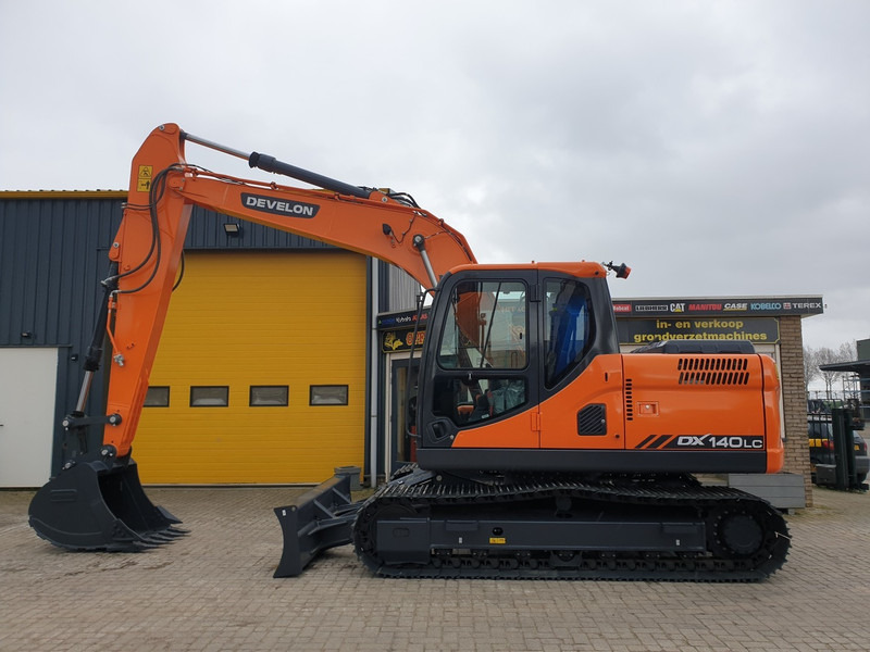 Develon DX140LC - Ekskavator me zinxhirë: foto 1 Develon DX140LC - Ekskavator me zinxhirë: foto 1