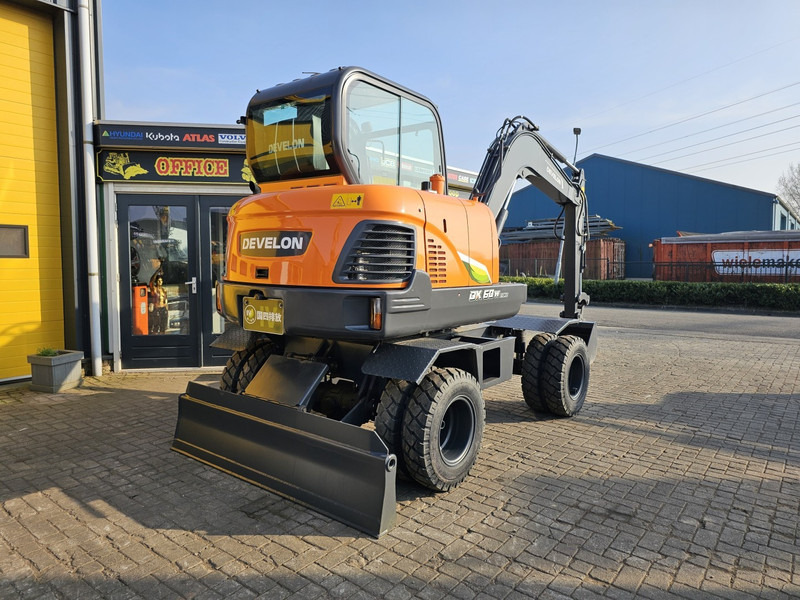 Develon DX60WN ECO-1 - Ekskavator me goma: foto 4 Develon DX60WN ECO-1 - Ekskavator me goma: foto 4