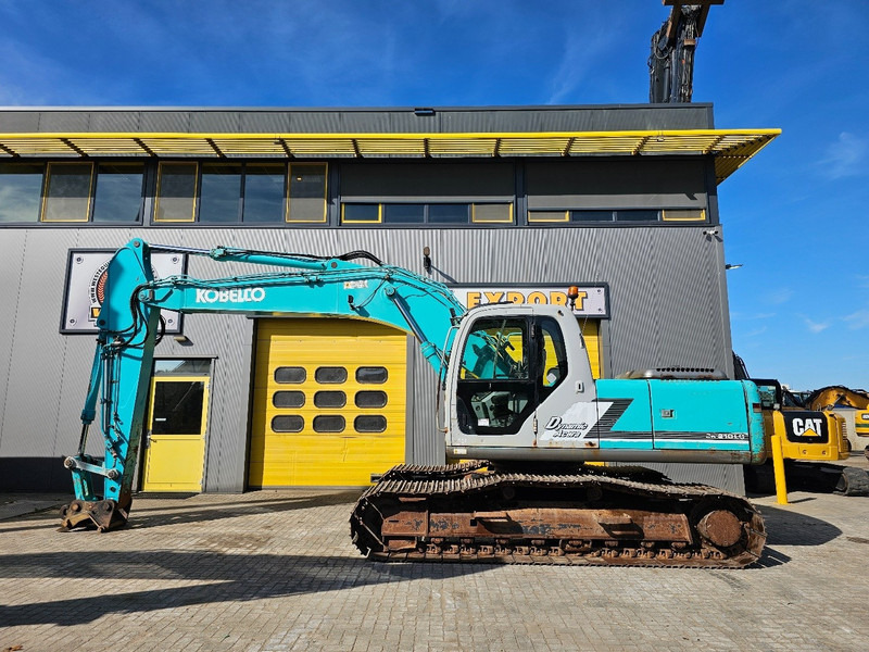 Kobelco SK210LC-6 - Ekskavator me zinxhirë: foto 1 Kobelco SK210LC-6 - Ekskavator me zinxhirë: foto 1