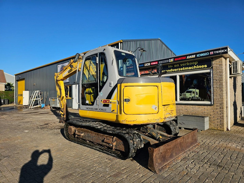 New Holland E80 - Ekskavator me zinxhirë: foto 3 New Holland E80 - Ekskavator me zinxhirë: foto 3