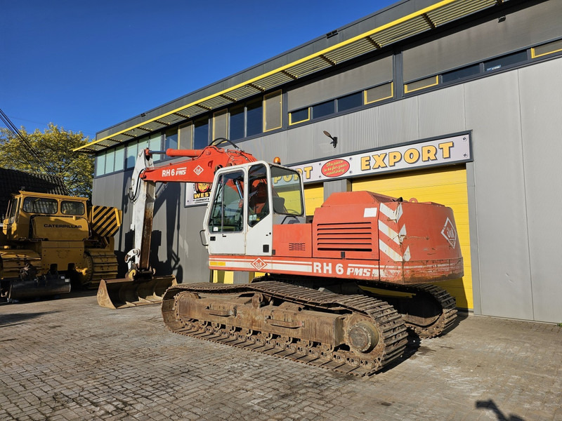 O & K RH6 - Ekskavator me zinxhirë: foto 3 O & K RH6 - Ekskavator me zinxhirë: foto 3