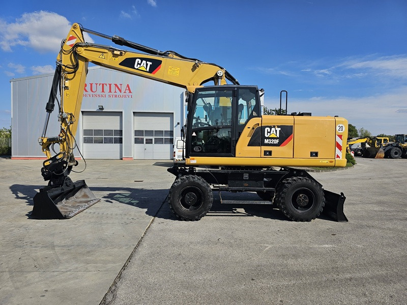 CATERPILLAR M320F - Ekskavator me goma: foto 1 CATERPILLAR M320F - Ekskavator me goma: foto 1