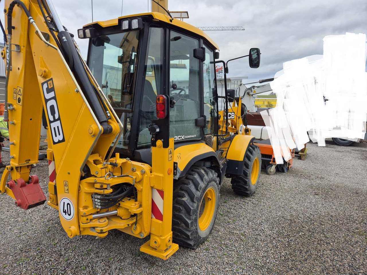 JCB 3CX Compact - Fadromë me shkarkim nga prapa: foto 3 JCB 3CX Compact - Fadromë me shkarkim nga prapa: foto 3