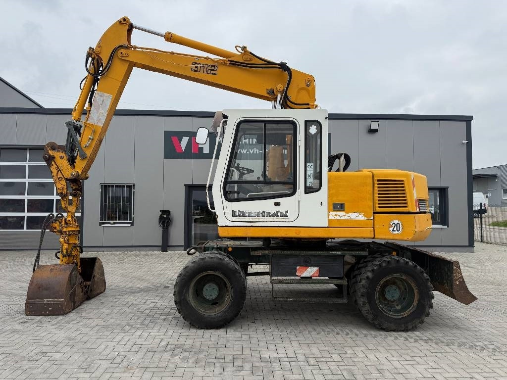 Liebherr A 312 - Ekskavator me goma: foto 2 Liebherr A 312 - Ekskavator me goma: foto 2