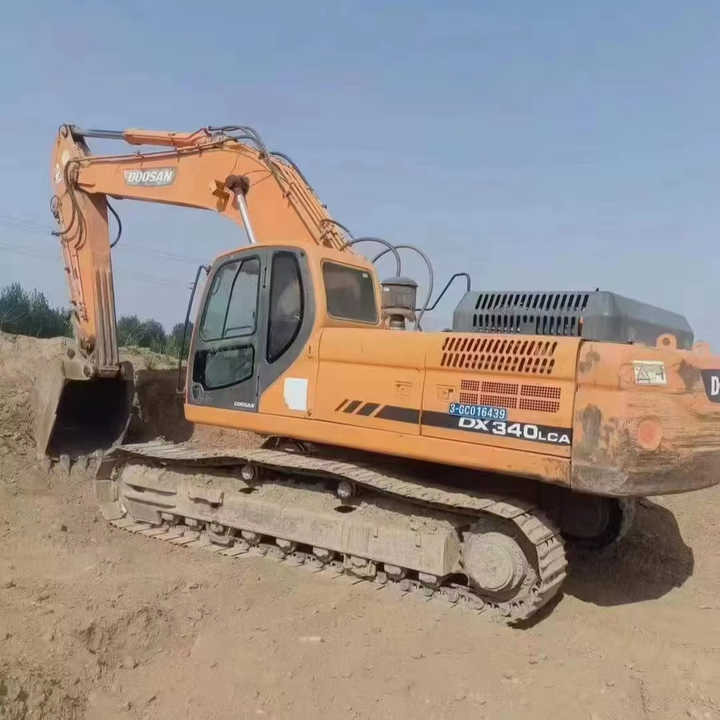 Used Original Korea Doosan 34 Ton Excavator with Cheap Price and Good Condition DOOSAN Dx340LCA Dx225 Dx330 DX360for Sale - Ekskavator me zinxhirë: foto 1 Used Original Korea Doosan 34 Ton Excavator with Cheap Price and Good Condition DOOSAN Dx340LCA Dx225 Dx330 DX360for Sale - Ekskavator me zinxhirë: foto 1