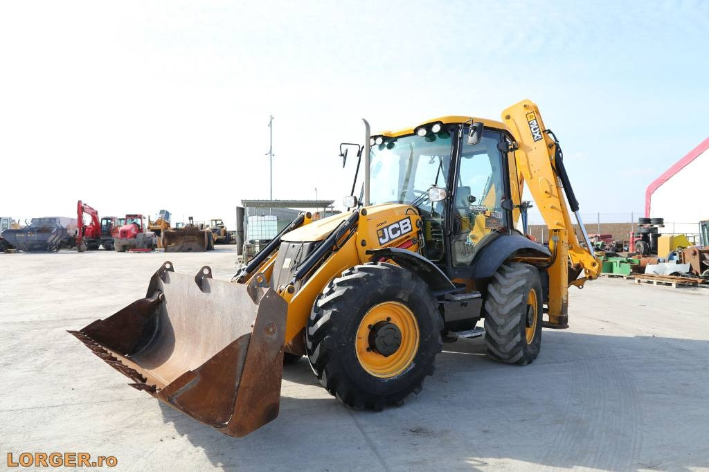 JCB 3 CX Super - Fadromë me shkarkim nga prapa: foto 1 JCB 3 CX Super - Fadromë me shkarkim nga prapa: foto 1