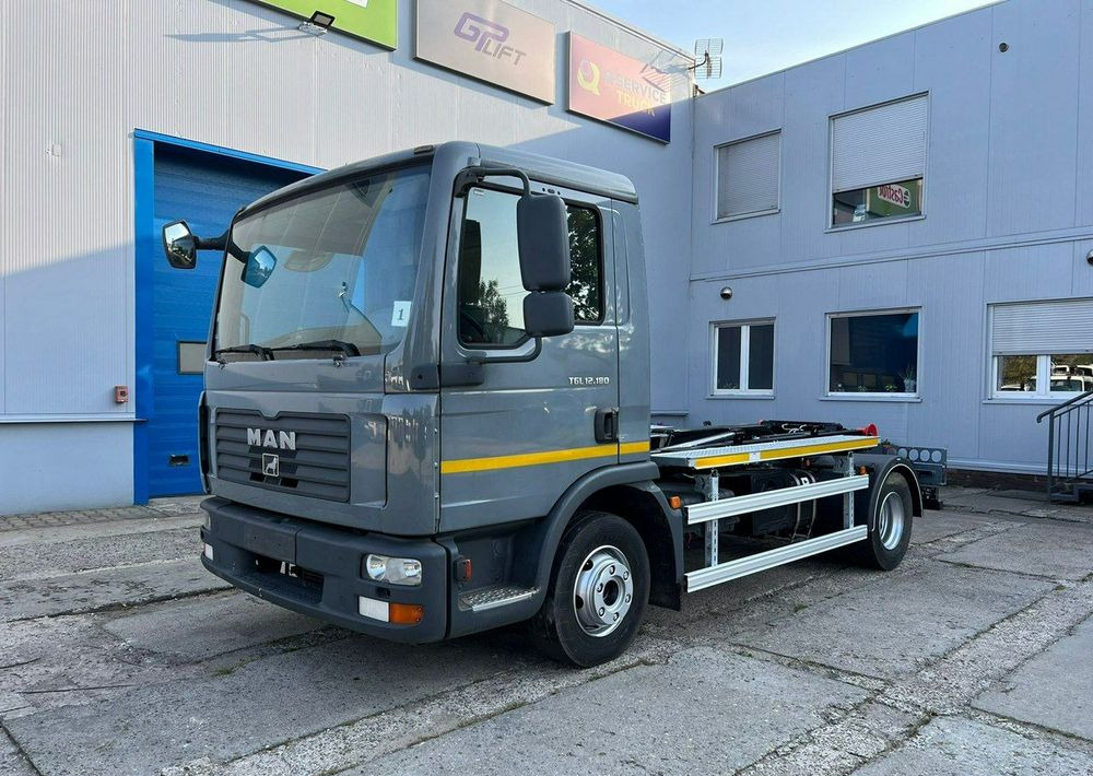 MAN TGL 12.180, hakowiec Janco/GP Lift - Kamion mbeturinash: foto 1 MAN TGL 12.180, hakowiec Janco/GP Lift - Kamion mbeturinash: foto 1