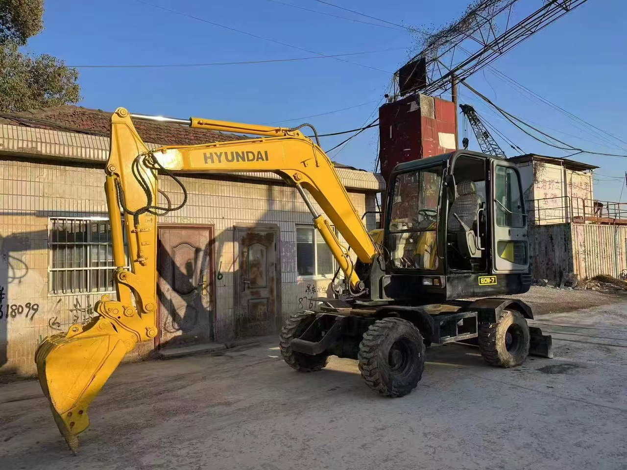 Huyndai 60W-7 - Ekskavator me goma: foto 1 Huyndai 60W-7 - Ekskavator me goma: foto 1