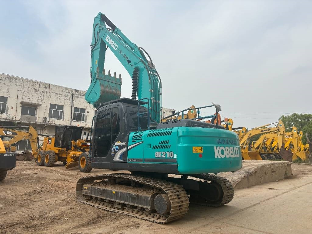 Ekskavator me zinxhirë Kobelco SK 210: foto 6 Ekskavator me zinxhirë Kobelco SK 210: foto 6