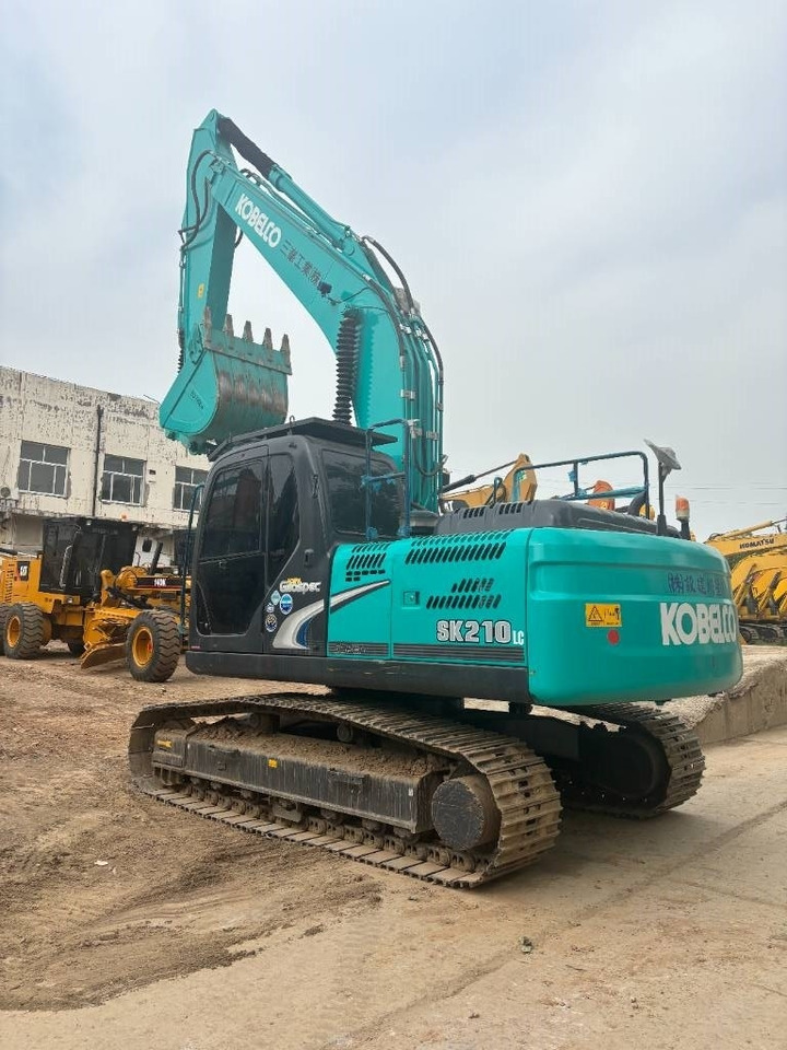 Kobelco SK 210 - Ekskavator me zinxhirë: foto 5 Kobelco SK 210 - Ekskavator me zinxhirë: foto 5