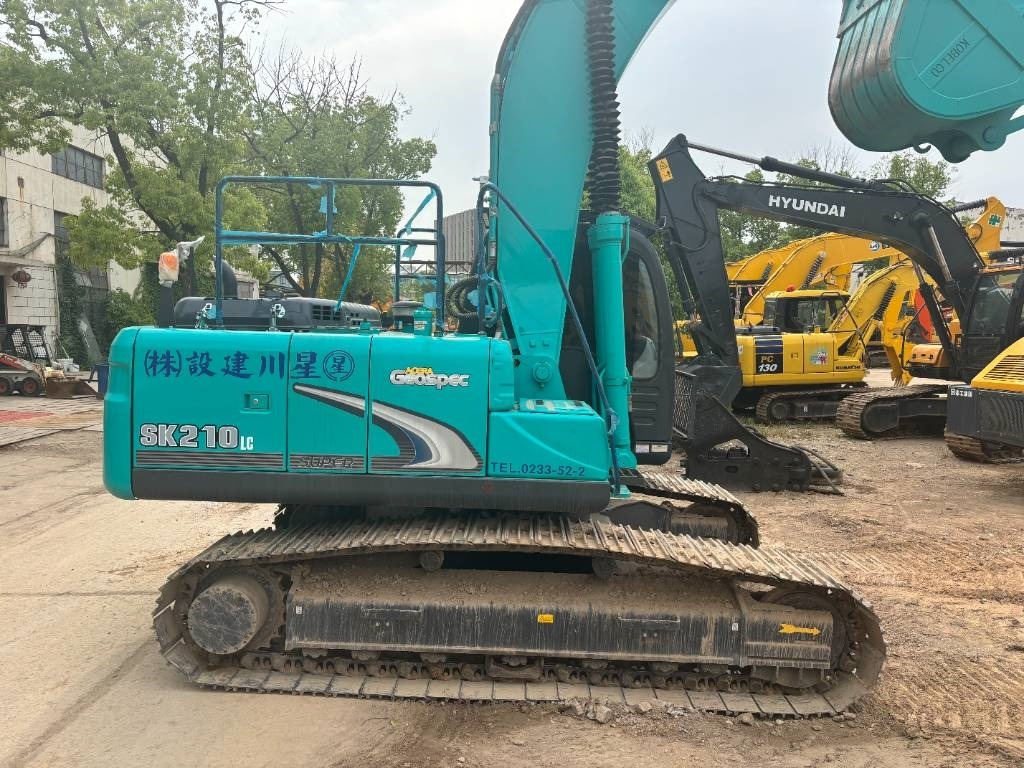 Ekskavator me zinxhirë Kobelco SK 210: foto 10 Ekskavator me zinxhirë Kobelco SK 210: foto 10