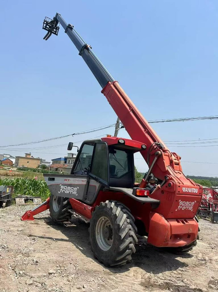 Ekskavator teleskopik Manitou MT 1740 SL T: foto 1