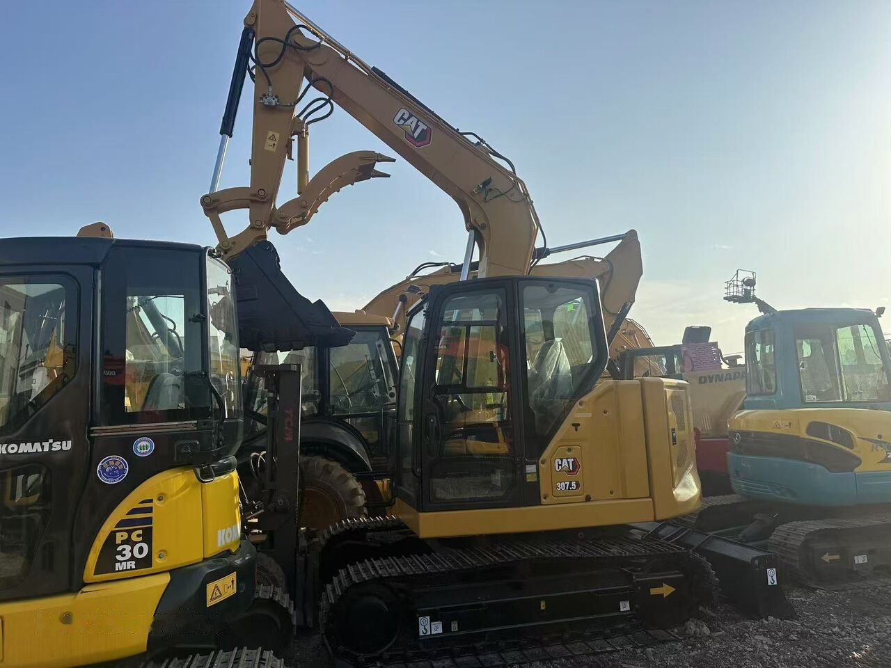 Caterpillar 307.5 - Ekskavator me zinxhirë: foto 4 Caterpillar 307.5 - Ekskavator me zinxhirë: foto 4