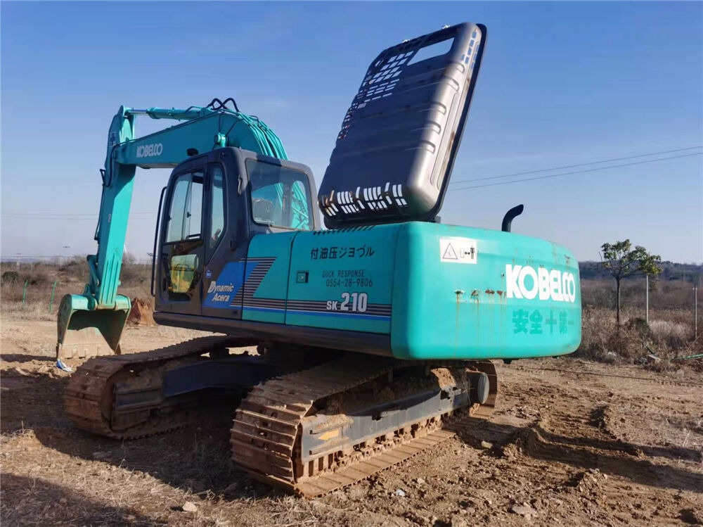 Kobelco SK210 - Ekskavator me zinxhirë: foto 4 Kobelco SK210 - Ekskavator me zinxhirë: foto 4