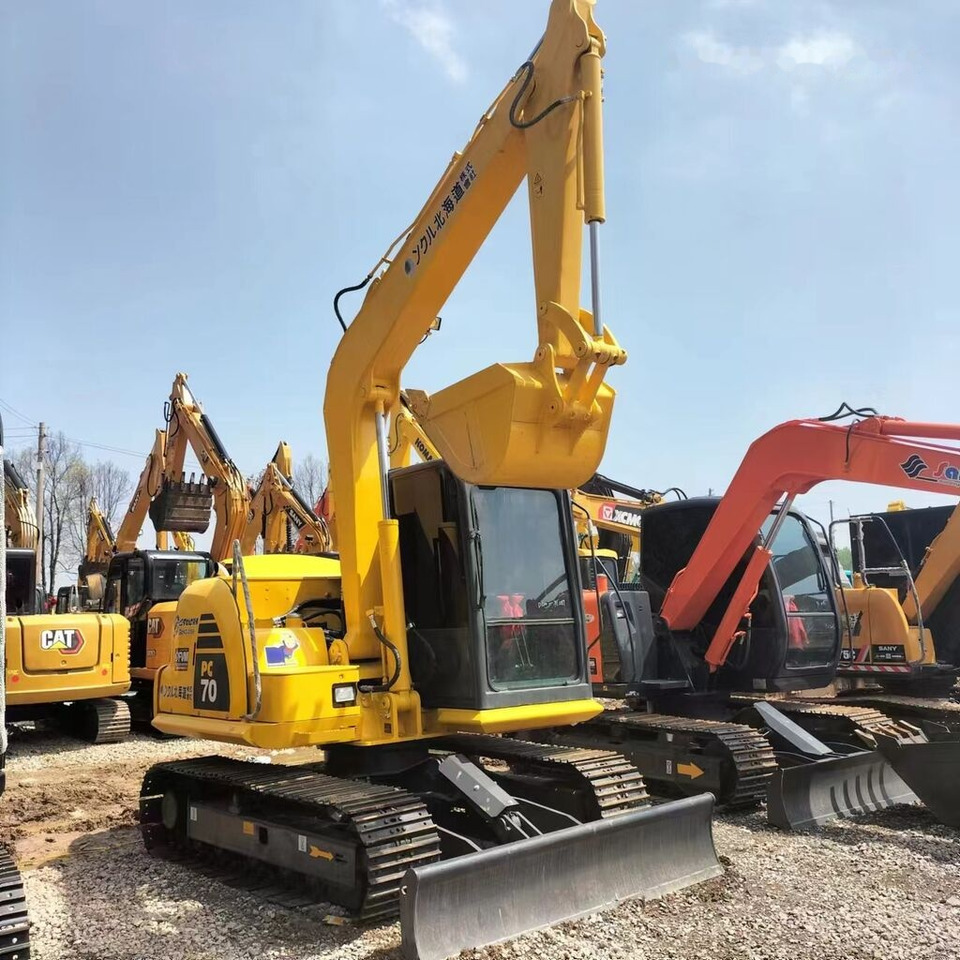Komatsu PC70 - Ekskavator me zinxhirë: foto 5 Komatsu PC70 - Ekskavator me zinxhirë: foto 5
