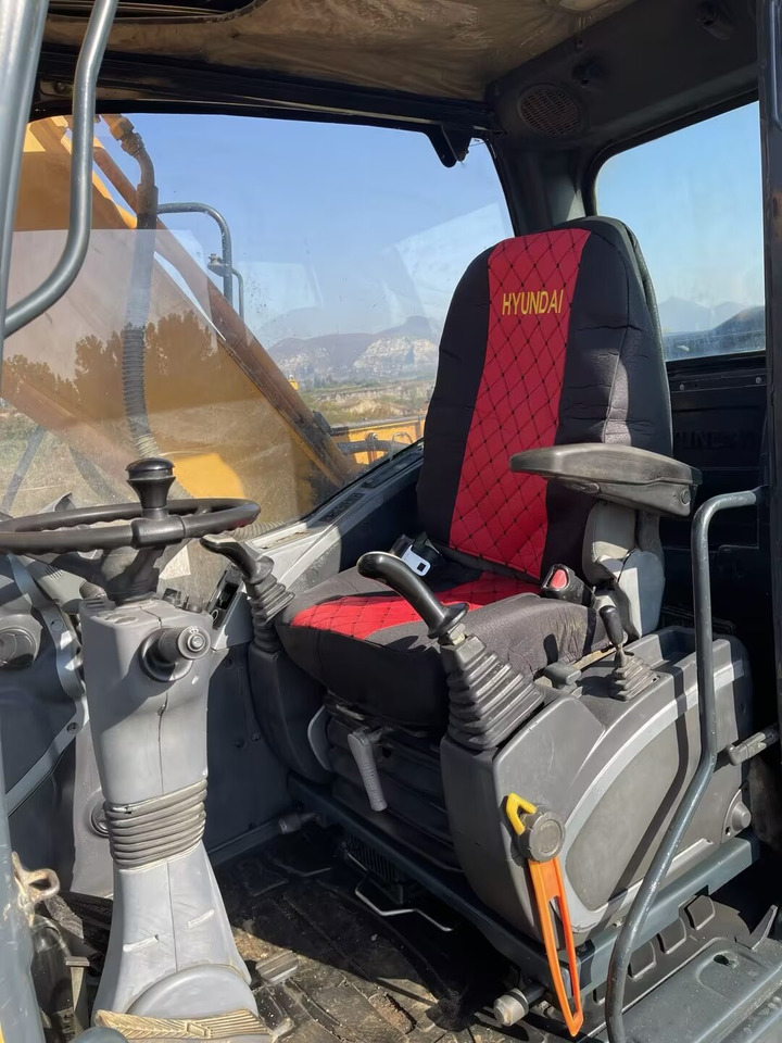 Ekskavator me goma HYUNDAI 210W-9: foto 8