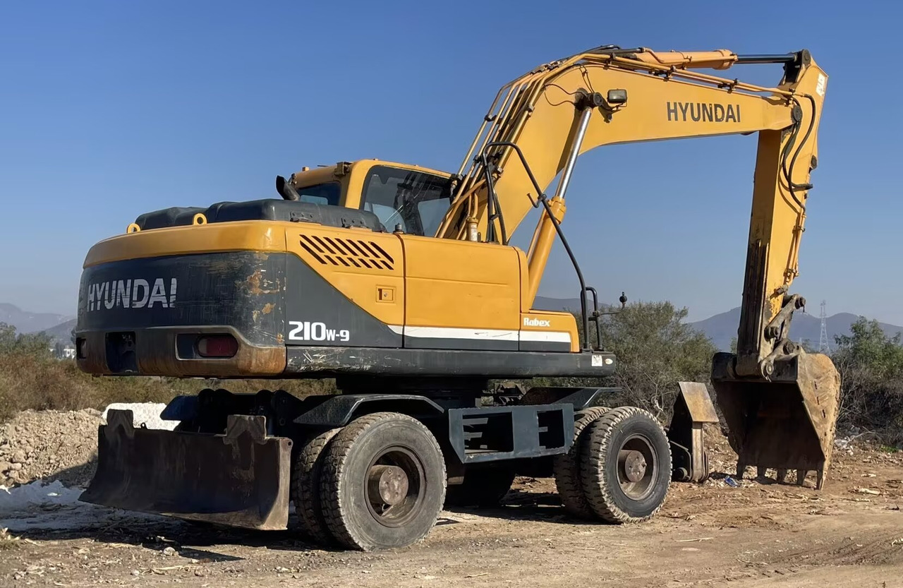 Ekskavator me goma HYUNDAI 210W-9: foto 9