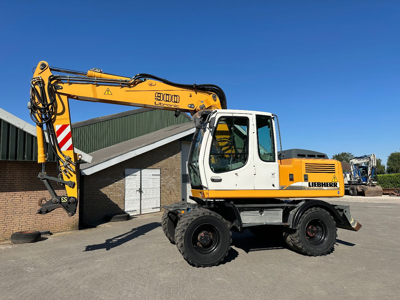 Liebherr A900C - Ekskavator me goma: foto 1 Liebherr A900C - Ekskavator me goma: foto 1