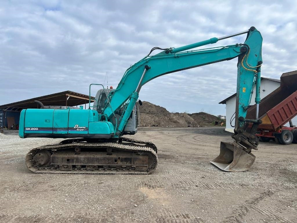 Kobelco SK 200-6 E - Ekskavator me zinxhirë: foto 5 Kobelco SK 200-6 E - Ekskavator me zinxhirë: foto 5
