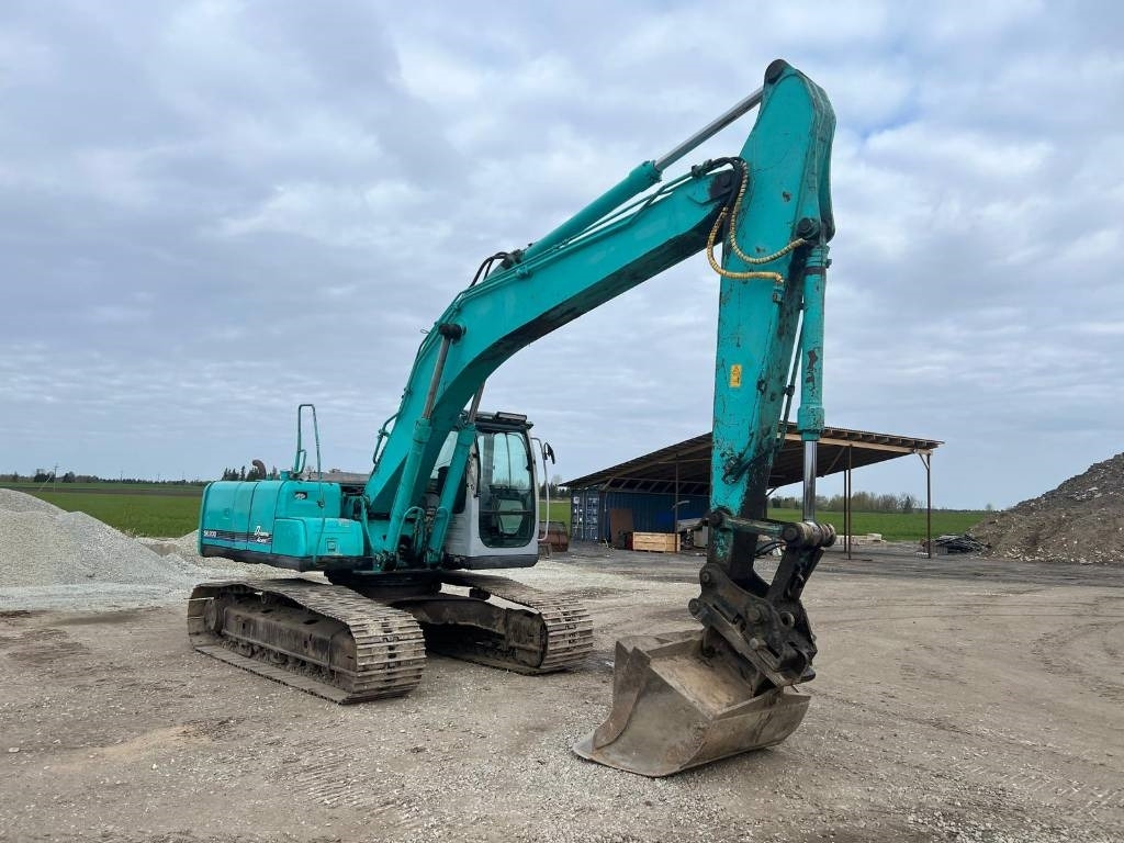 Kobelco SK 200-6 E - Ekskavator me zinxhirë: foto 2 Kobelco SK 200-6 E - Ekskavator me zinxhirë: foto 2