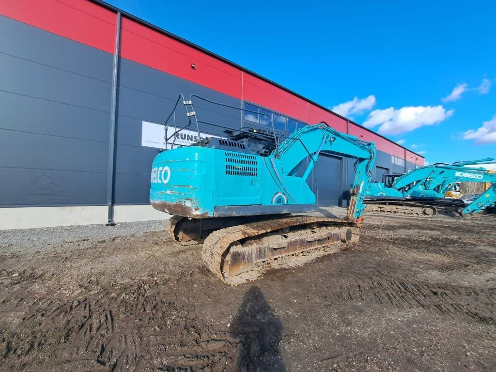 Kobelco SK 210-10 - Ekskavator me zinxhirë: foto 4 Kobelco SK 210-10 - Ekskavator me zinxhirë: foto 4