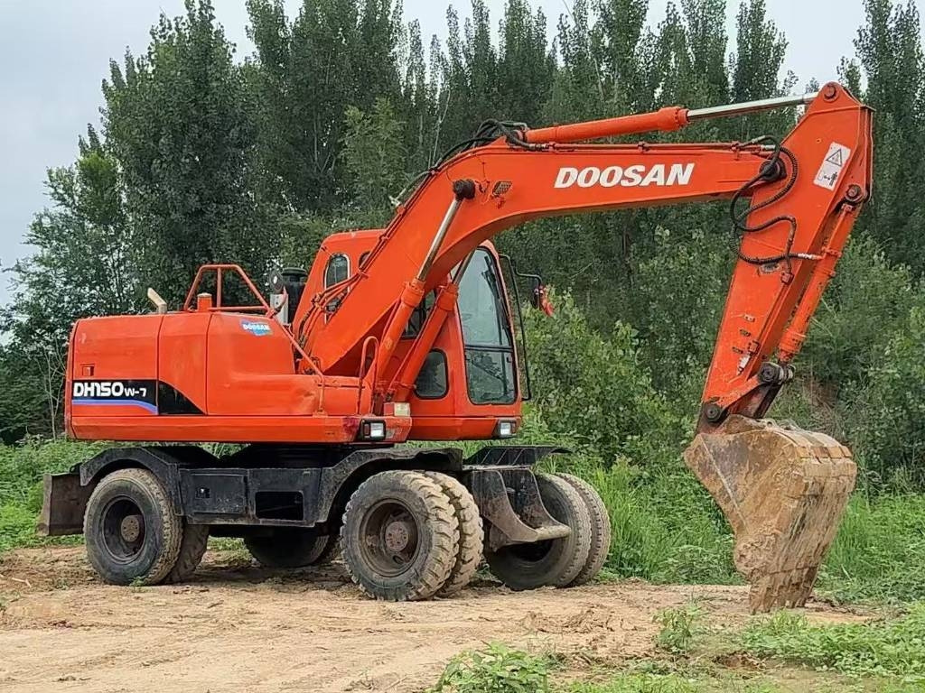 Doosan DH 150 W-7 - Ekskavator me goma: foto 1 Doosan DH 150 W-7 - Ekskavator me goma: foto 1