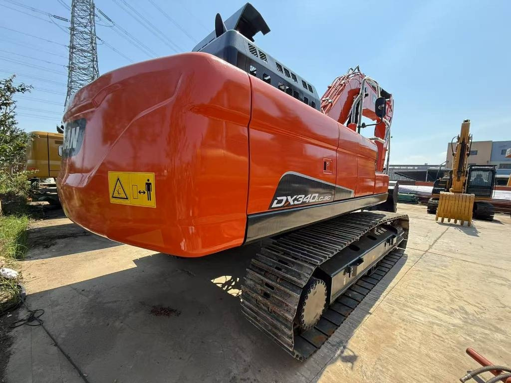 Doosan DX 340 - Ekskavator me zinxhirë: foto 1 Doosan DX 340 - Ekskavator me zinxhirë: foto 1