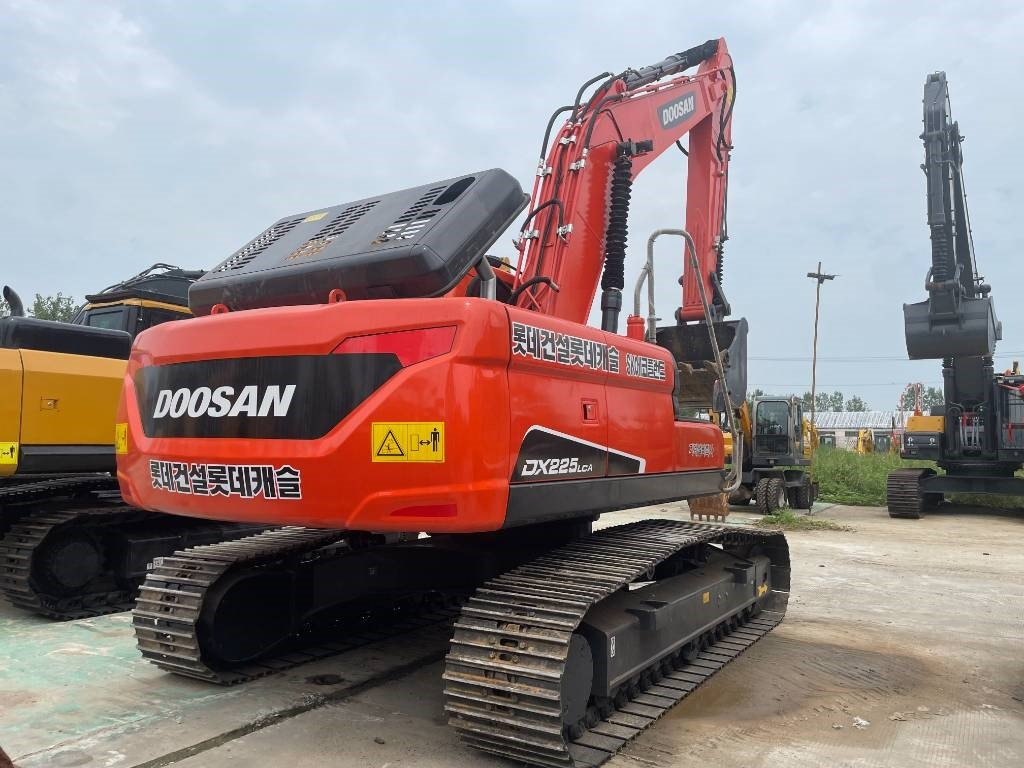 Doosan DX225LCA - Ekskavator me zinxhirë: foto 3 Doosan DX225LCA - Ekskavator me zinxhirë: foto 3
