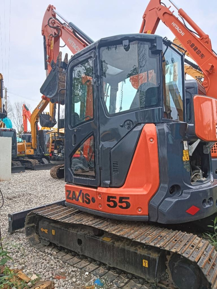 Hitachi ZX 55 - Ekskavator me zinxhirë: foto 1 Hitachi ZX 55 - Ekskavator me zinxhirë: foto 1