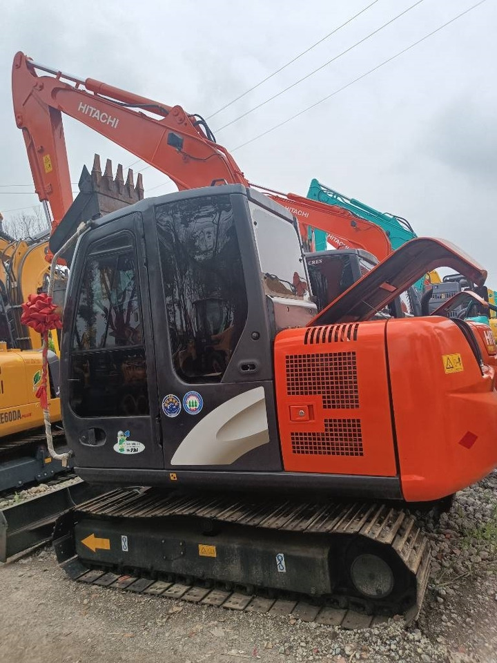 Hitachi ZX 60 - Ekskavator me zinxhirë: foto 2 Hitachi ZX 60 - Ekskavator me zinxhirë: foto 2