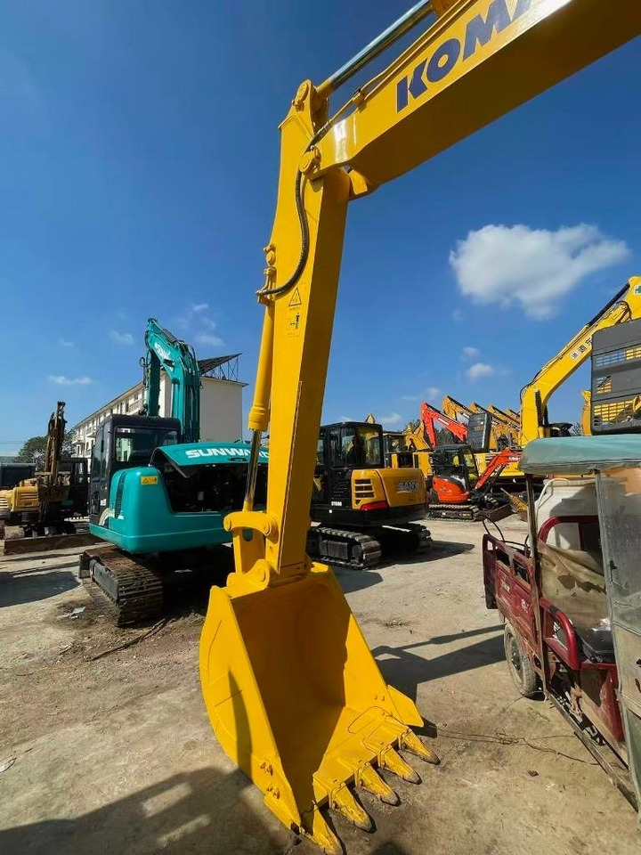 Komatsu PC 130 - Ekskavator me zinxhirë: foto 3 Komatsu PC 130 - Ekskavator me zinxhirë: foto 3