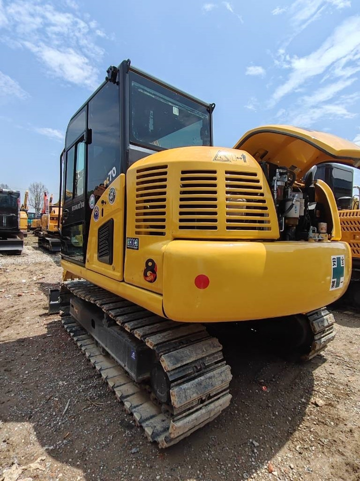 Komatsu PC 70 - Ekskavator me zinxhirë: foto 2 Komatsu PC 70 - Ekskavator me zinxhirë: foto 2