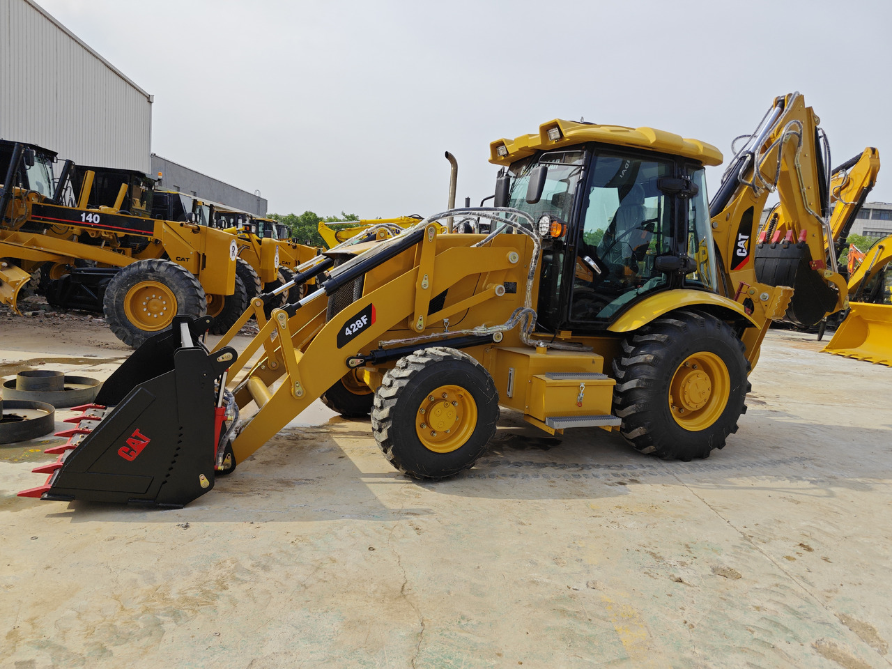 Fadromë me shkarkim nga prapa CATERPILLAR 428F backhoe loader: foto 6