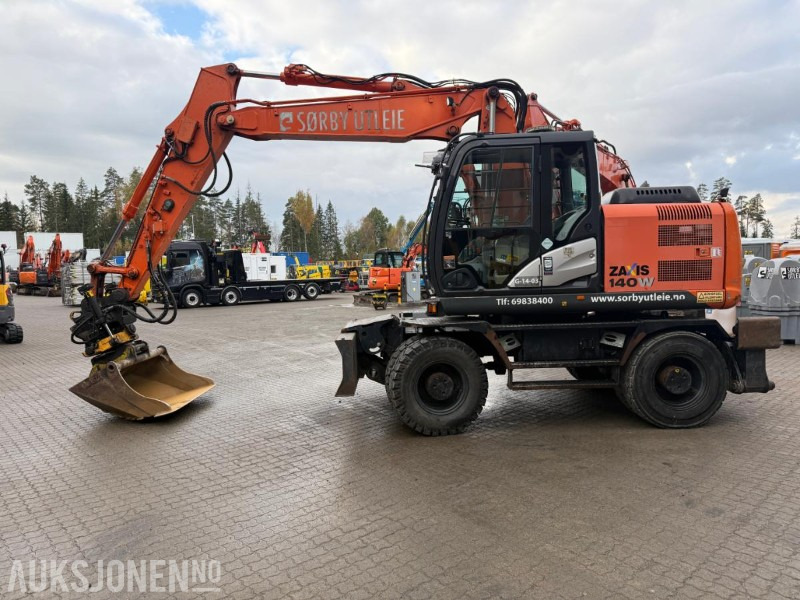 2014 Hitachi Zaxis 140W HJULGRAVER ENGCON ROTOTILT SERVICEHISTORIKK SENTRALSMØRING. - Ekskavator: foto 1 2014 Hitachi Zaxis 140W HJULGRAVER ENGCON ROTOTILT SERVICEHISTORIKK SENTRALSMØRING. - Ekskavator: foto 1