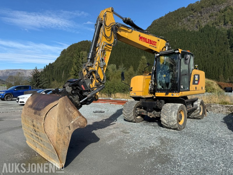 2018 Velholdt Cat M318F Hjulgraver med OilQuick Rototilt R6, 9577 timer - Ekskavator: foto 2 2018 Velholdt Cat M318F Hjulgraver med OilQuick Rototilt R6, 9577 timer - Ekskavator: foto 2
