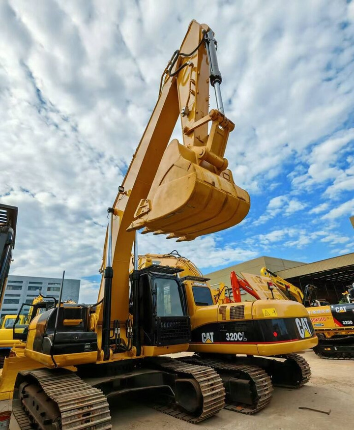 Caterpillar 320CL - Ekskavator me goma: foto 1 Caterpillar 320CL - Ekskavator me goma: foto 1