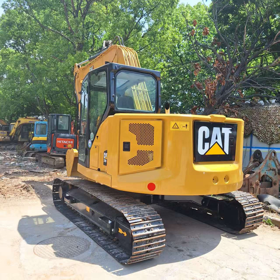 Cat 310 Excavator - Ekskavator me zinxhirë: foto 4 Cat 310 Excavator - Ekskavator me zinxhirë: foto 4