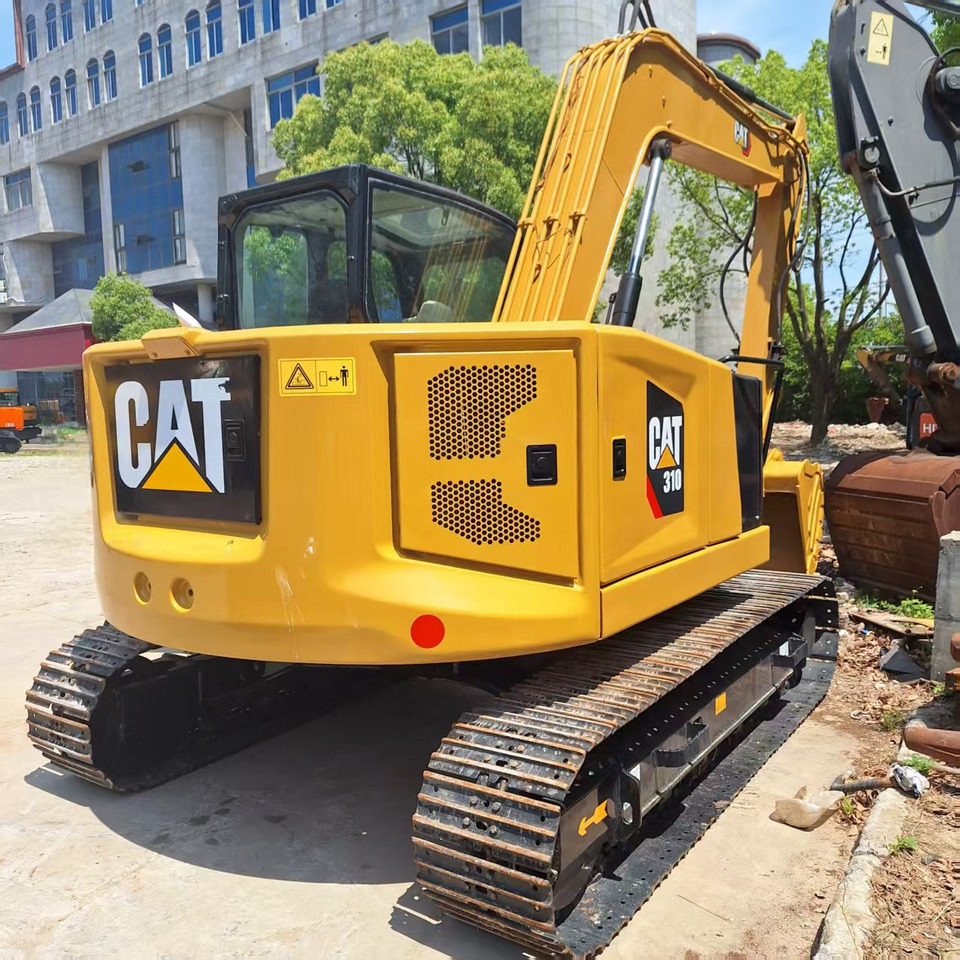 Cat 310 Excavator - Ekskavator me zinxhirë: foto 1 Cat 310 Excavator - Ekskavator me zinxhirë: foto 1