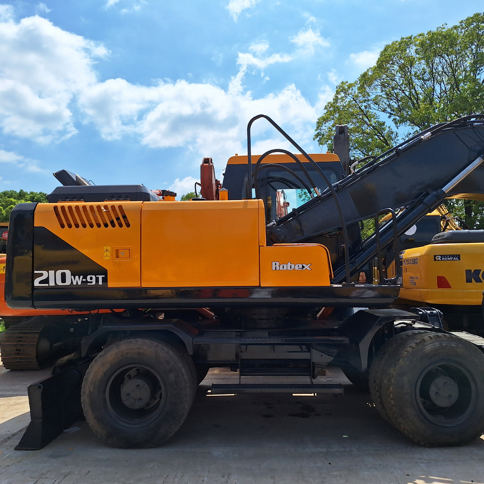 Hyundai 210w-9 wheel excavator - Ekskavator me goma: foto 3 Hyundai 210w-9 wheel excavator - Ekskavator me goma: foto 3