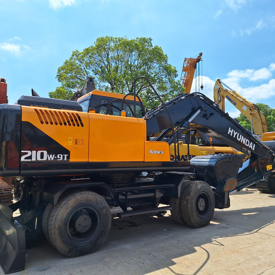 Hyundai 210w-9 wheel excavator - Ekskavator me goma: foto 1 Hyundai 210w-9 wheel excavator - Ekskavator me goma: foto 1