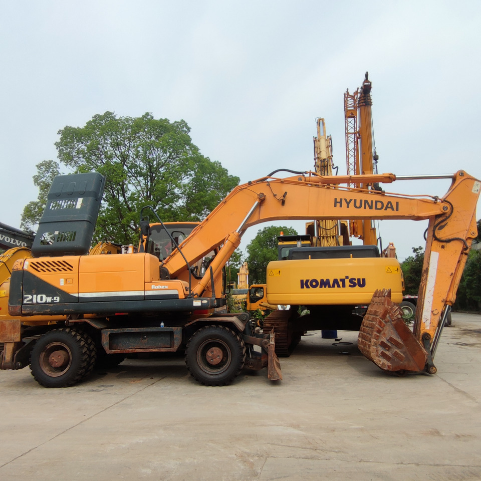Hyundai 210w-9 wheel excavator - Ekskavator me goma: foto 3 Hyundai 210w-9 wheel excavator - Ekskavator me goma: foto 3