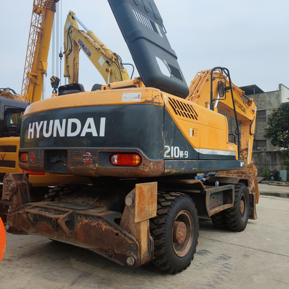 Hyundai 210w-9 wheel excavator - Ekskavator me goma: foto 4 Hyundai 210w-9 wheel excavator - Ekskavator me goma: foto 4