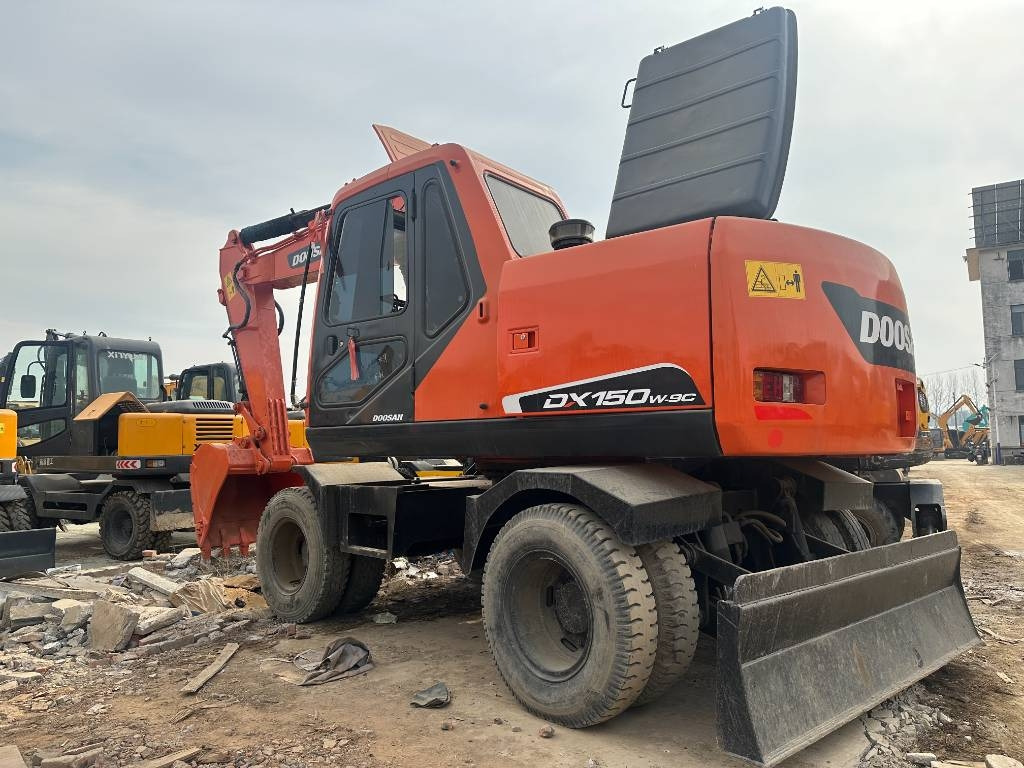Doosan DH 150 W-7  - Ekskavator me goma: foto 1 Doosan DH 150 W-7  - Ekskavator me goma: foto 1