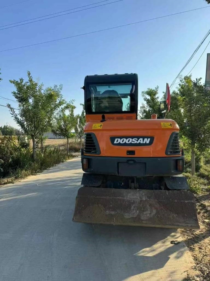 Doosan DX 60 - Ekskavator me zinxhirë: foto 2 Doosan DX 60 - Ekskavator me zinxhirë: foto 2